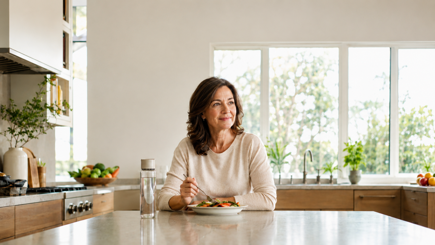 Woman enjoying a healthy prepared meal while following a structured meal plan to support sustainable weight loss